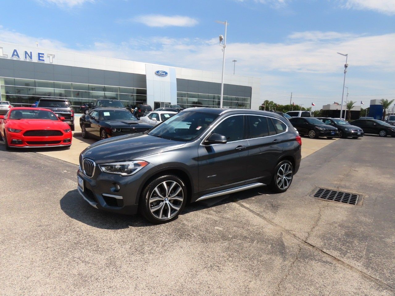 Used 2017 BMW X1 28i with VIN WBXHT3C34H5F70167 for sale in Spring, TX