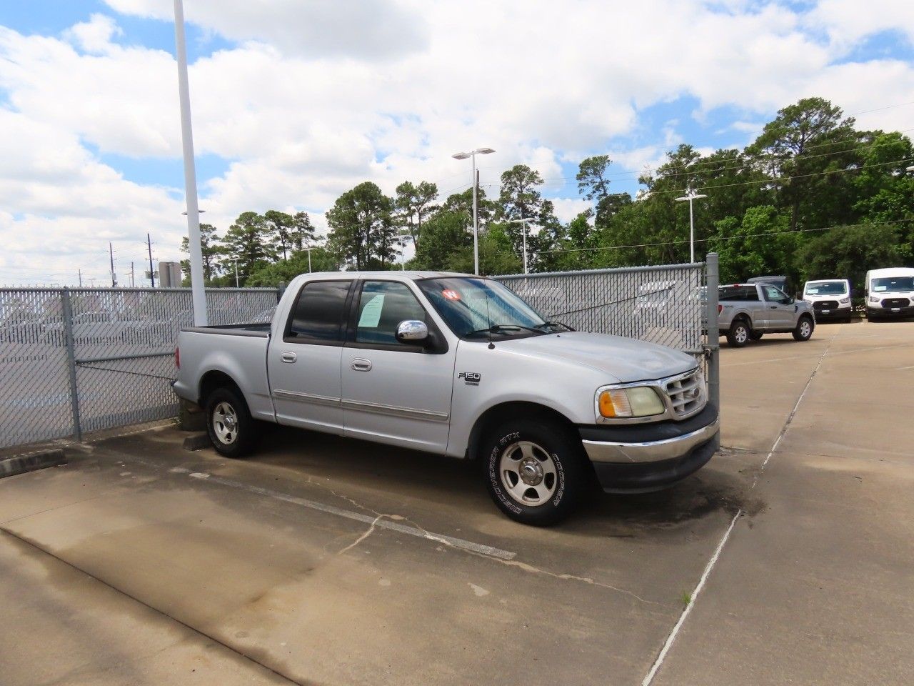 Used 2002 Ford F-150 XLT with VIN 1FTRW07612KC88750 for sale in Spring, TX