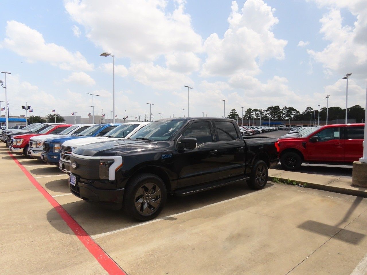 Certified 2024 Ford F-150 Lightning XLT with VIN 1FTVW3LK2RWG07420 for sale in Spring, TX