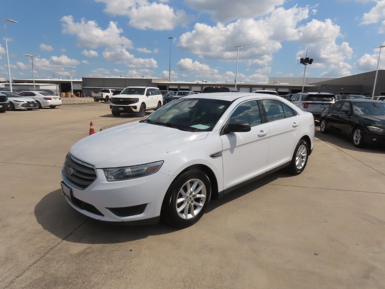 Used 2014 Ford Taurus SE with VIN 1FAHP2D8XEG150695 for sale in Spring, TX