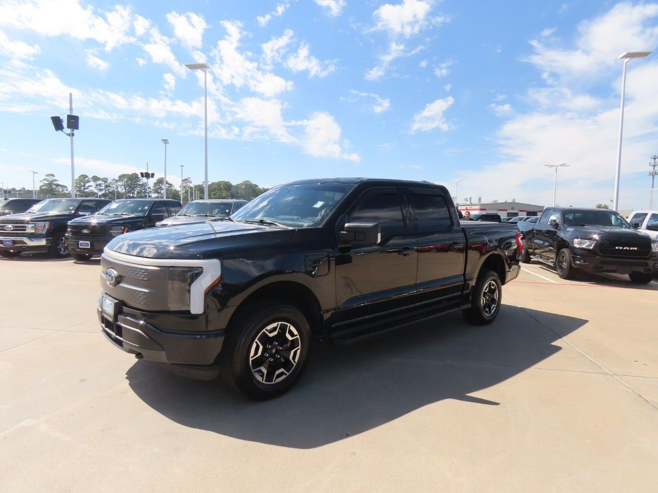 Certified 2023 Ford F-150 Lightning XLT with VIN 1FTVW1EL1PWG36348 for sale in Spring, TX