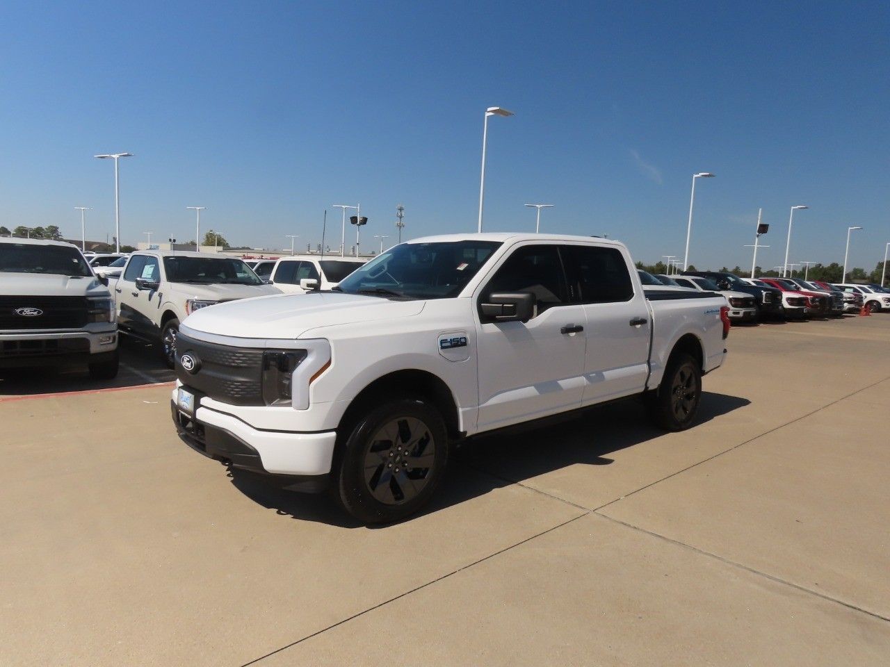 Certified 2024 Ford F-150 Lightning XLT with VIN 1FTVW3LK1RWG28744 for sale in Spring, TX
